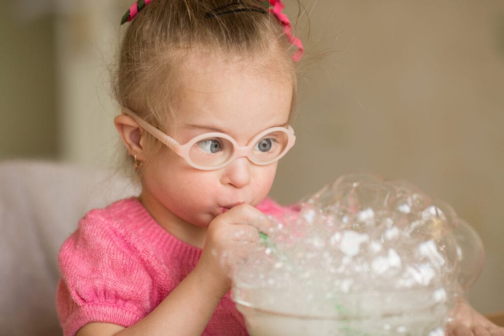 Girl blowing bubbles