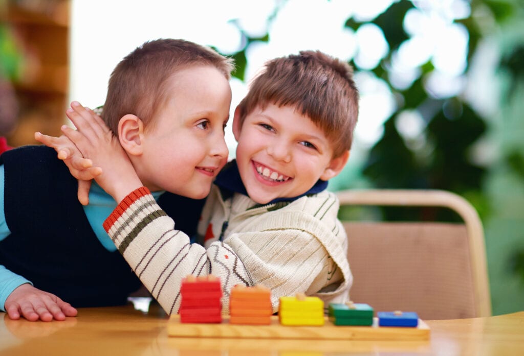 Kid hugging his brother